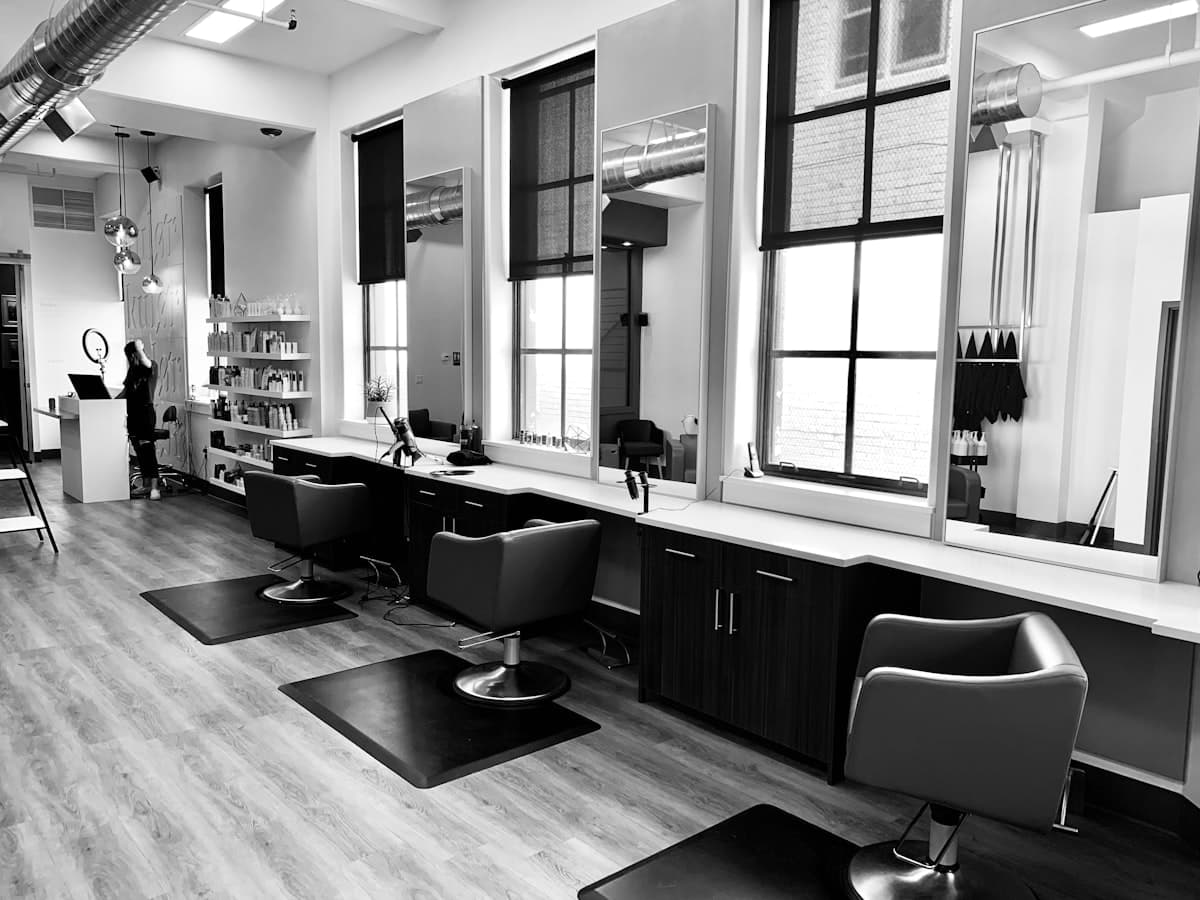 Premium hair salon interior with soft lighting